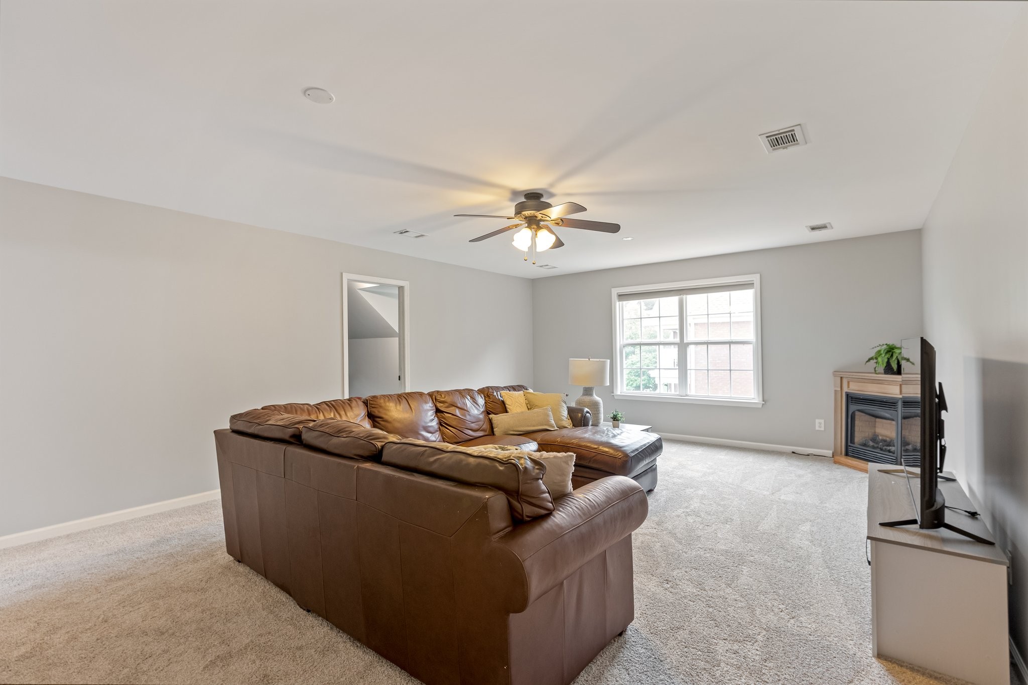 5048 Abington Ridge Lane Franklin, TN 37067 - Photo 55 of 64 a living room with furniture and a window