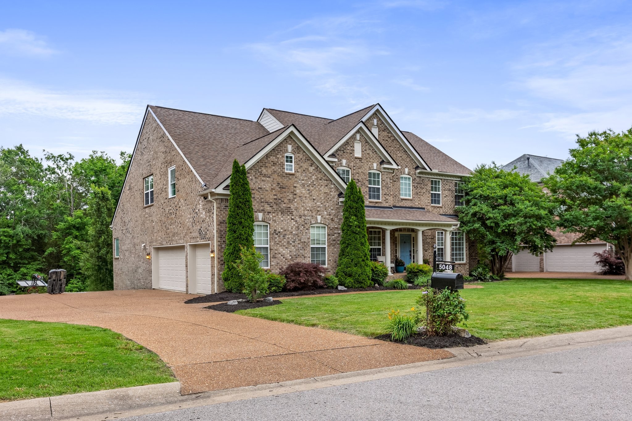 5048 Abington Ridge Lane Franklin, TN 37067 - Photo 57 of 64 a front view of house with yard and green space