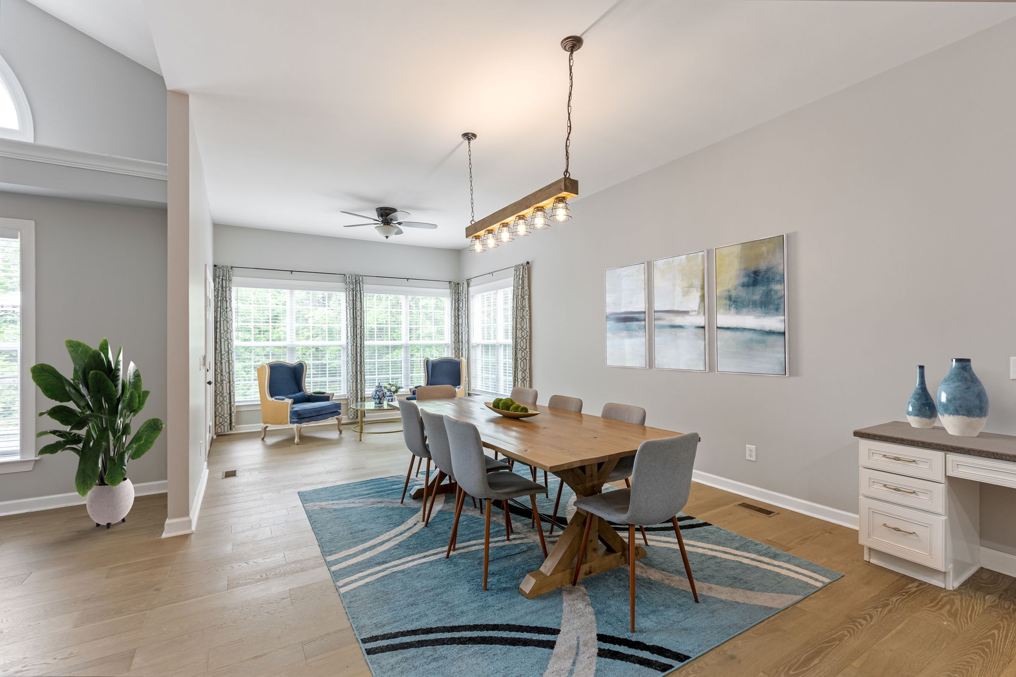 5048 Abington Ridge Lane Franklin, TN 37067 - Photo 60 of 64 a view of a dining room and livingroom with furniture wooden floor a chandelier