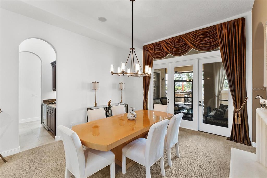 12812 Jacob Grace Court Windermere, FL 34786 - Photo 17 of 91 a dining room with furniture and window