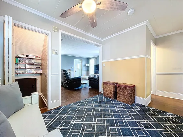 a bedroom with furniture and a window