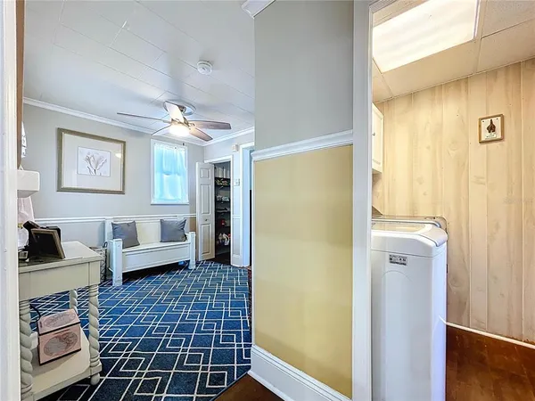 a kitchen with sink and cabinets