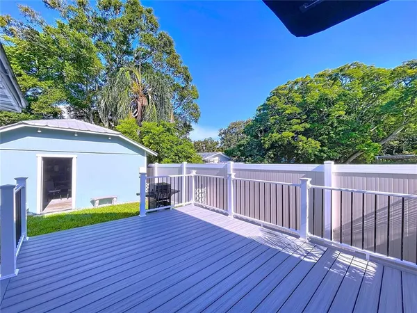 a view of back yard of the house