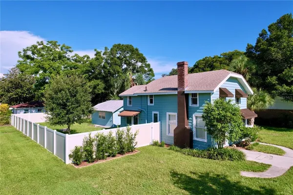 front view of a house with a yard
