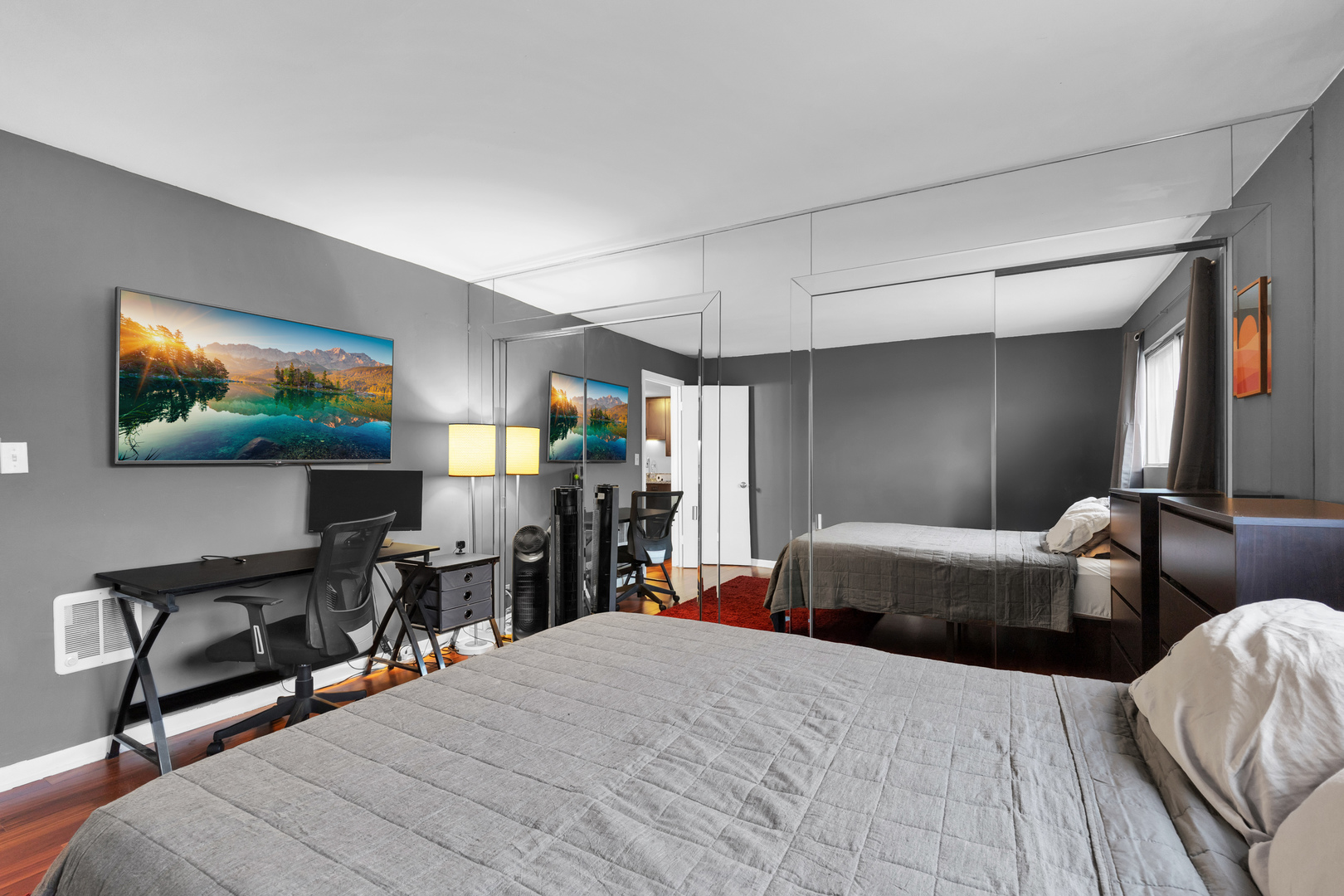 320 Circle Avenue, Unit 404 Forest Park, IL 60130 - Photo 11 of 16 a bedroom with furniture and a flat screen tv