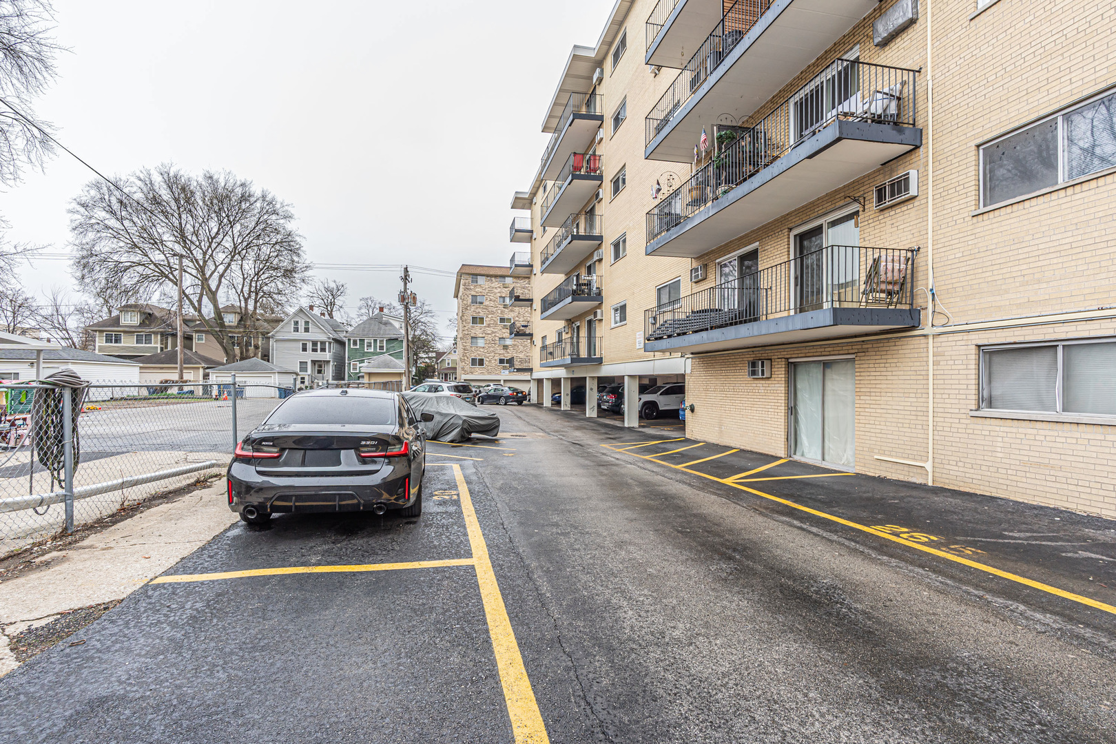 320 Circle Avenue, Unit 404 Forest Park, IL 60130 - Photo 15 of 16 a car parked on the side of a street