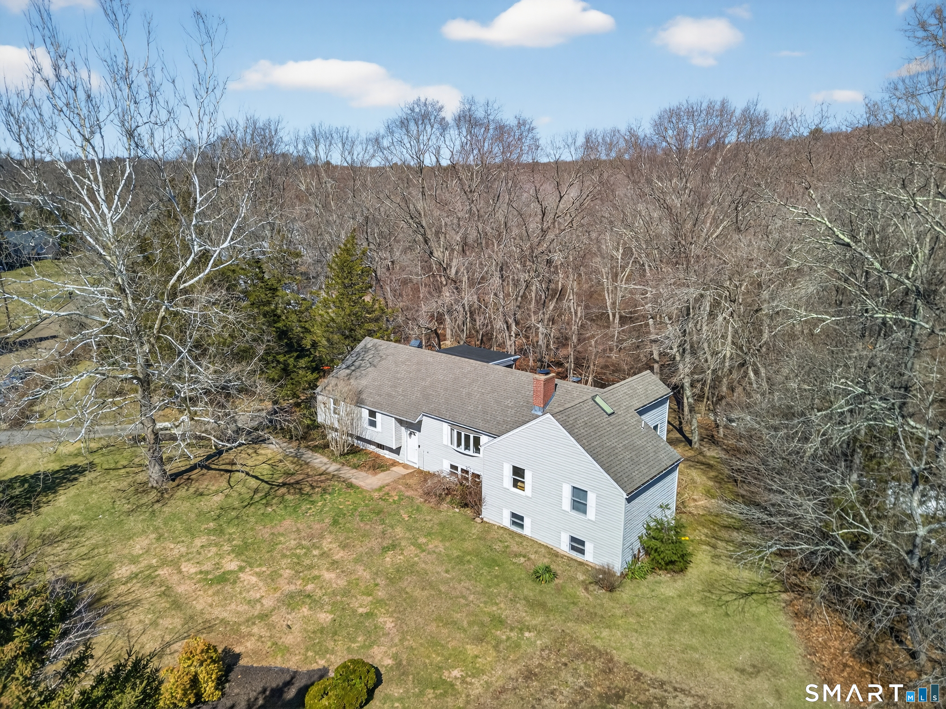 18 Riverside Terrace Madison, CT 06443 - Photo 2 of 40 a view of a houses with trees