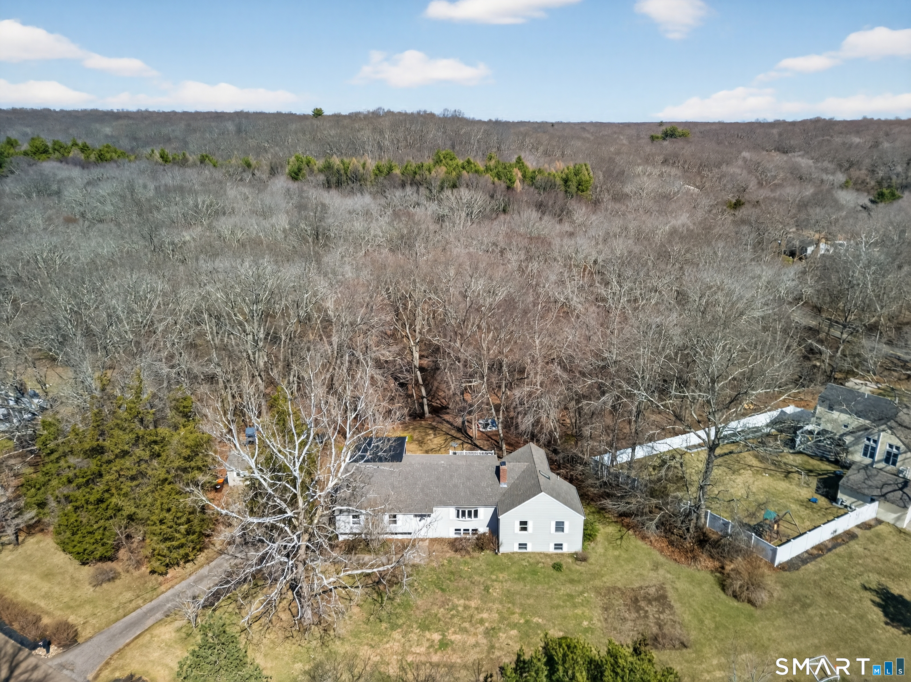 18 Riverside Terrace Madison, CT 06443 - Photo 37 of 40 a view of a forest with a mountain