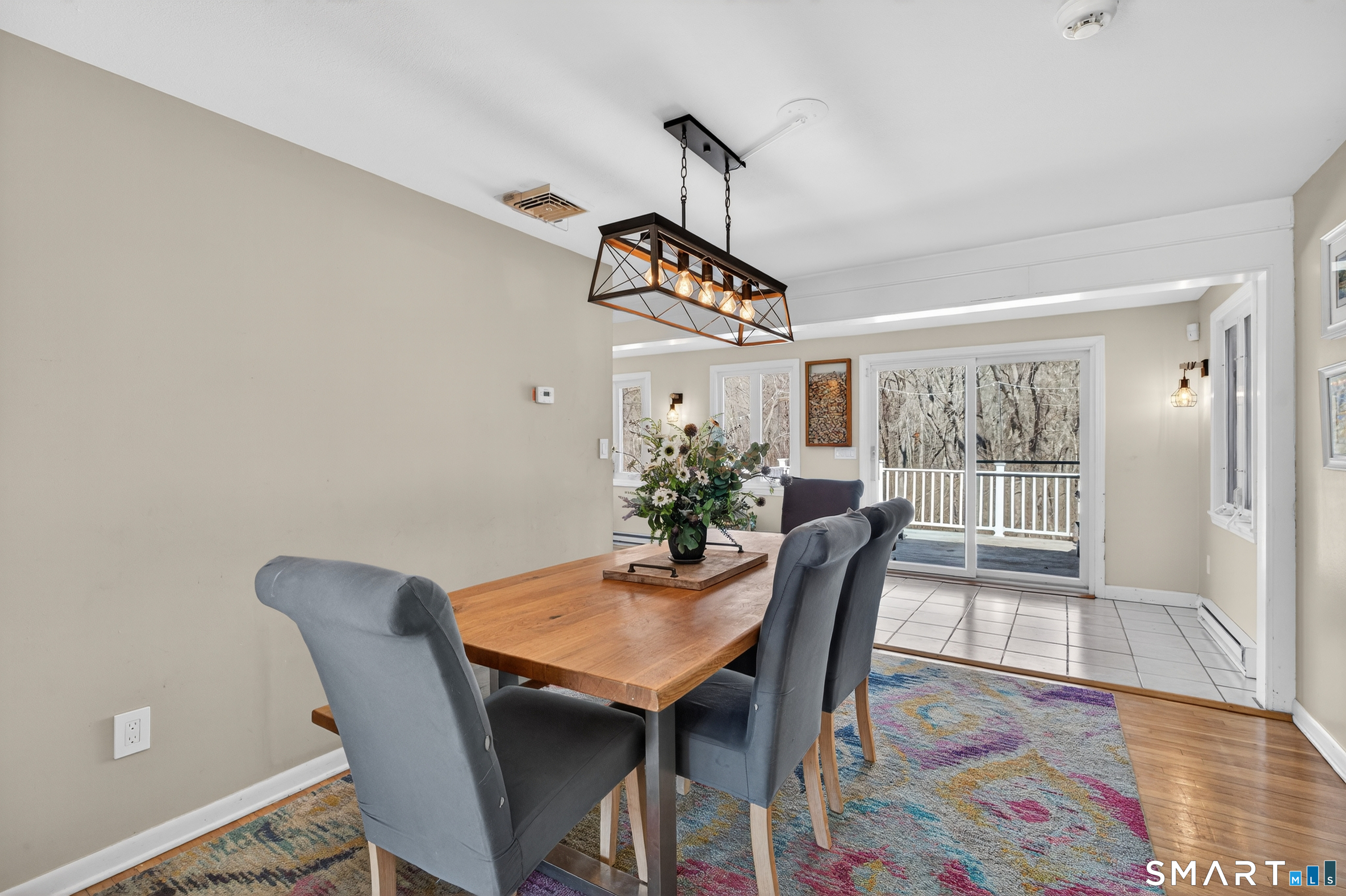 18 Riverside Terrace Madison, CT 06443 - Photo 8 of 40 a view of a dining room with furniture window and wooden floor