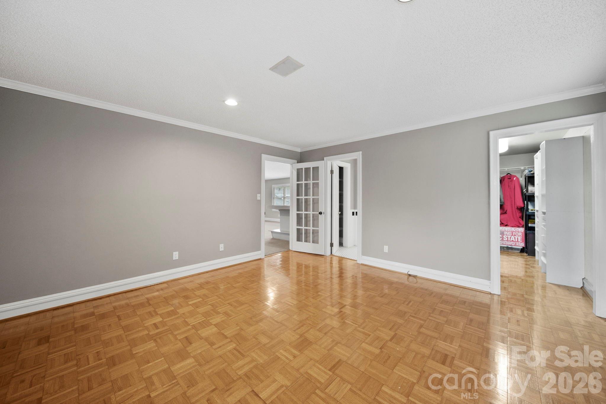 1109 Union Road Gastonia, NC 28054 - Photo 31 of 44 a view of an empty room with wooden floor and entryway