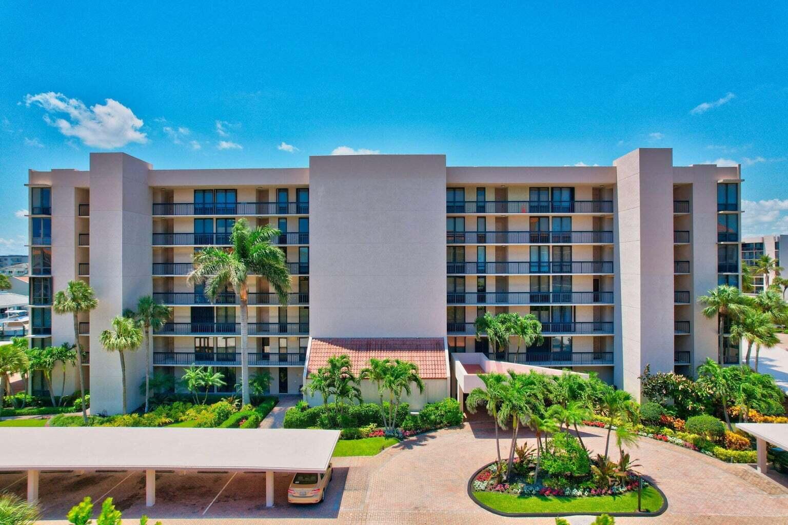 2707 North Ocean Boulevard, Unit D205 Boca Raton, FL 33431 - Photo 36 of 51 a front view of a building with plants