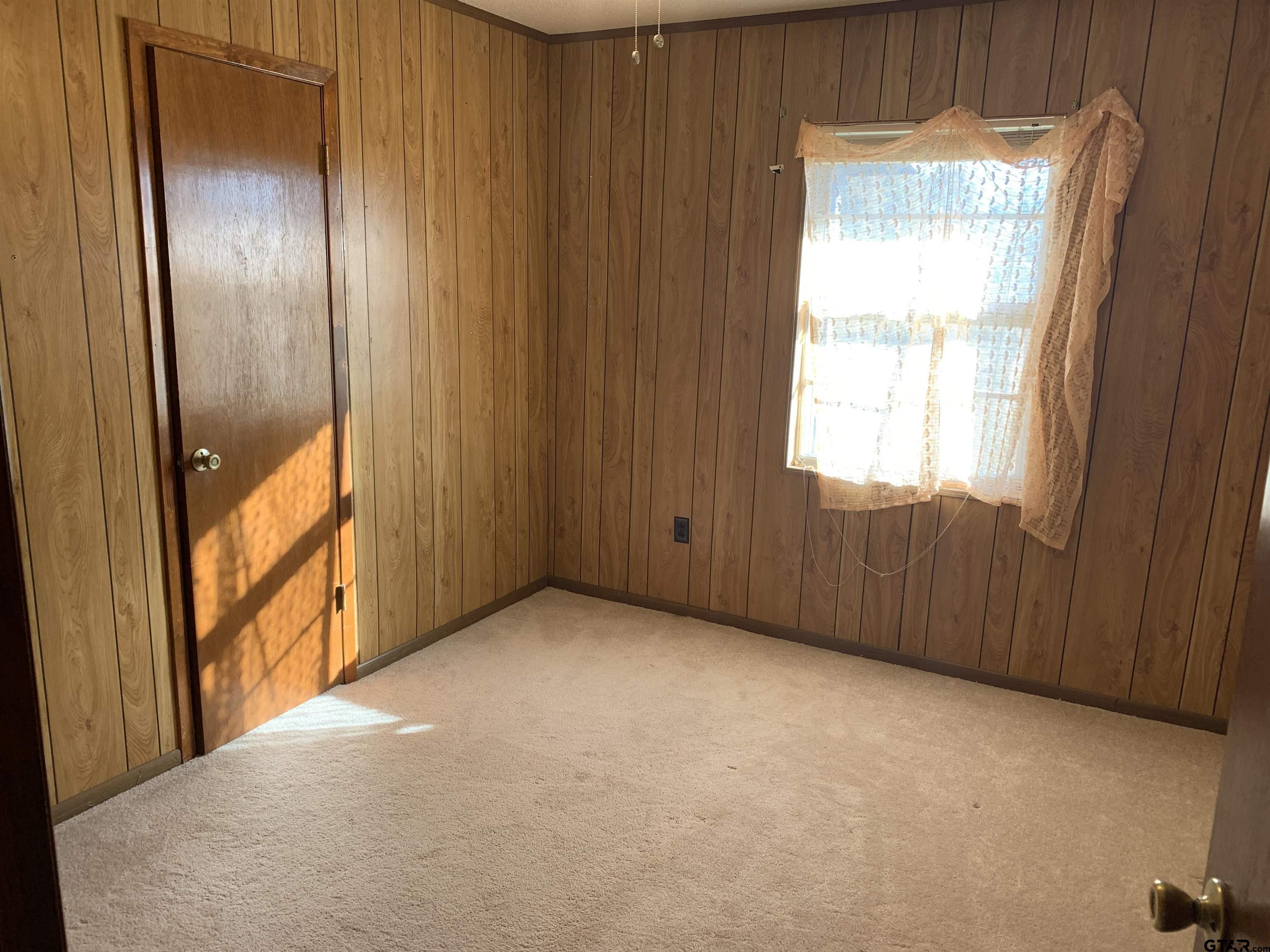 304 6th Street Southwest Bogata, TX 75417 - Photo 16 of 30 a view of an empty room with a window
