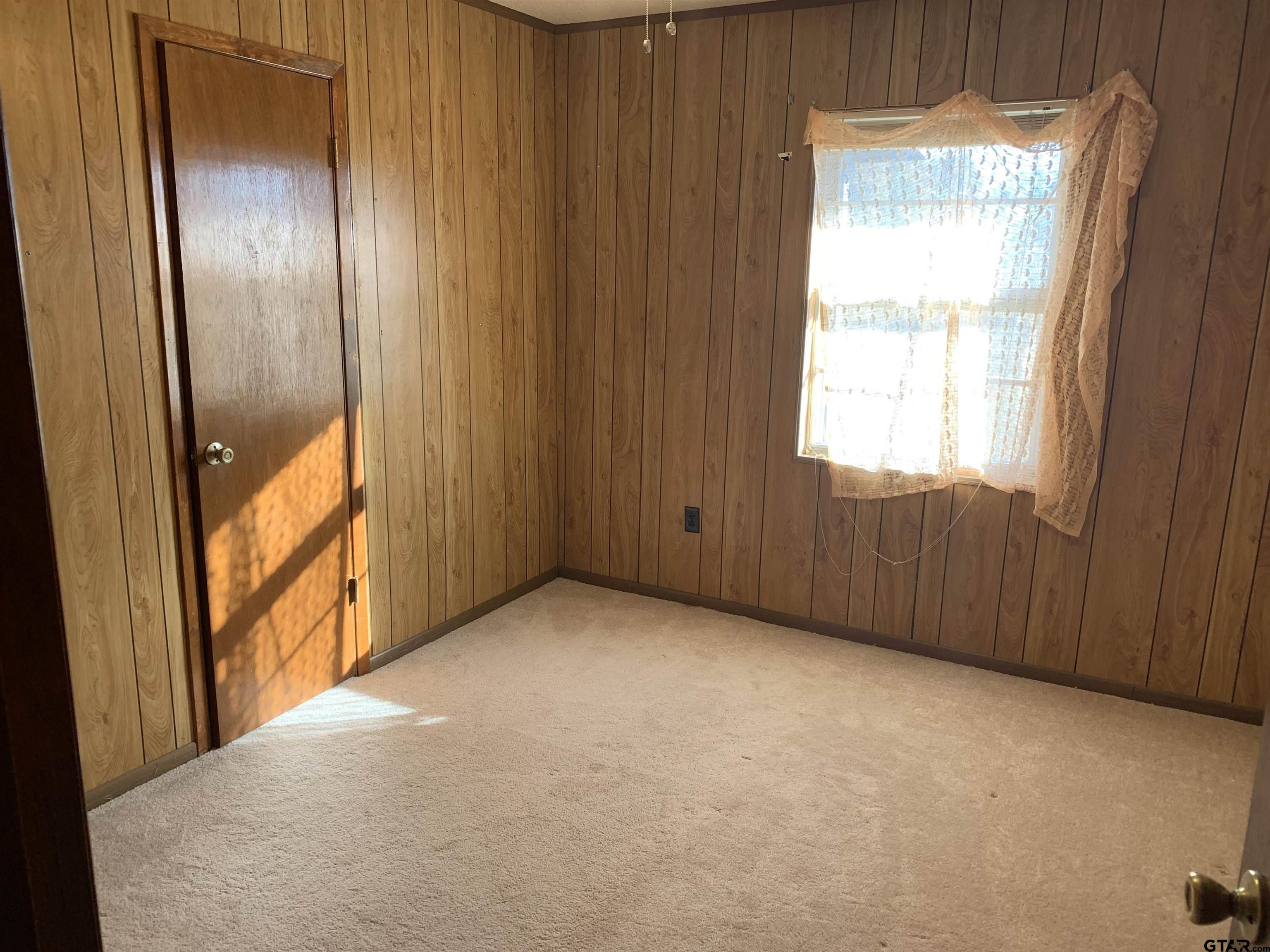 304 6th Street Southwest Bogata, TX 75417 - Photo 17 of 30 a view of an empty room and window