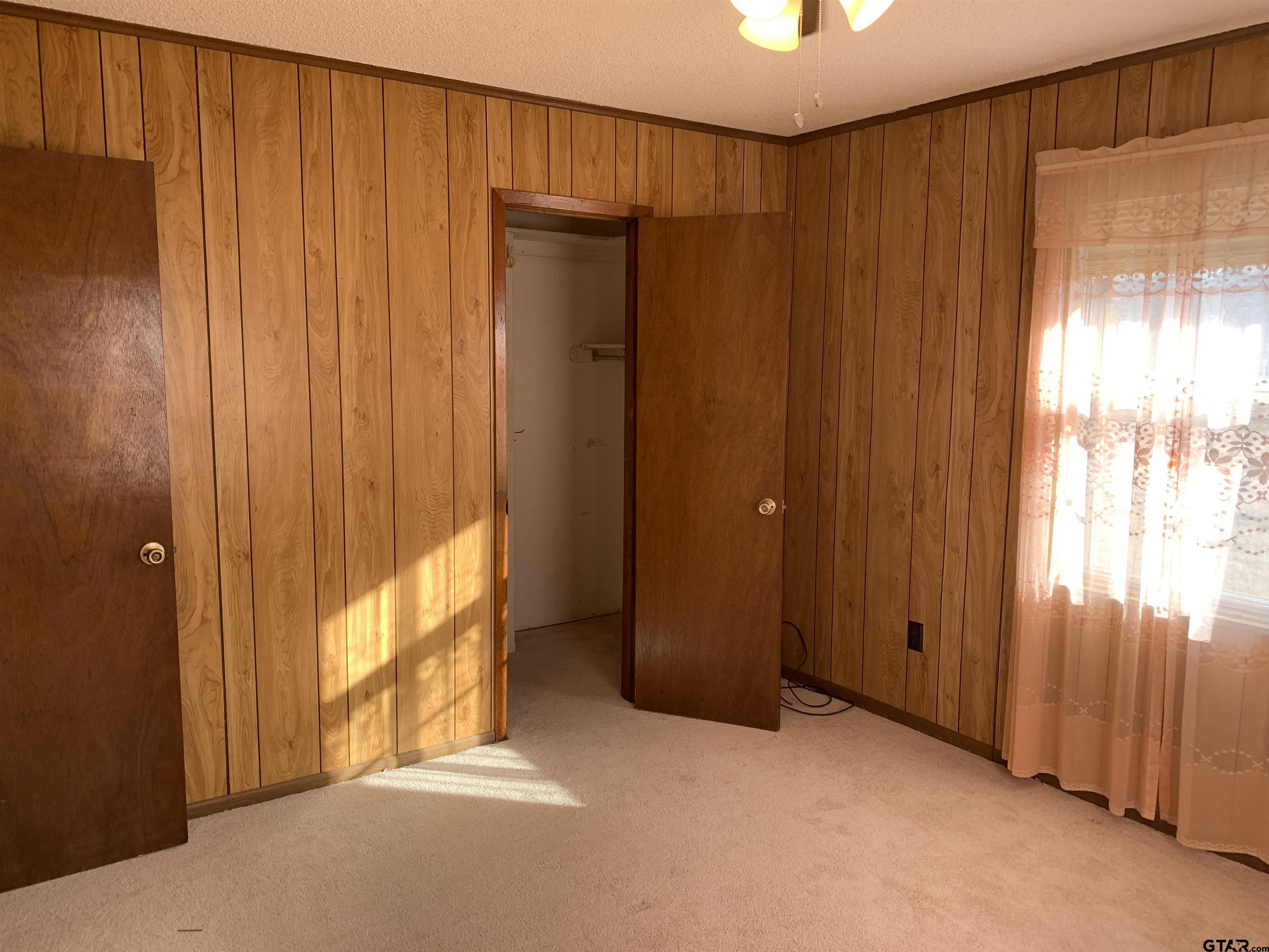 304 6th Street Southwest Bogata, TX 75417 - Photo 25 of 30 a view of a bathroom with shower and a window