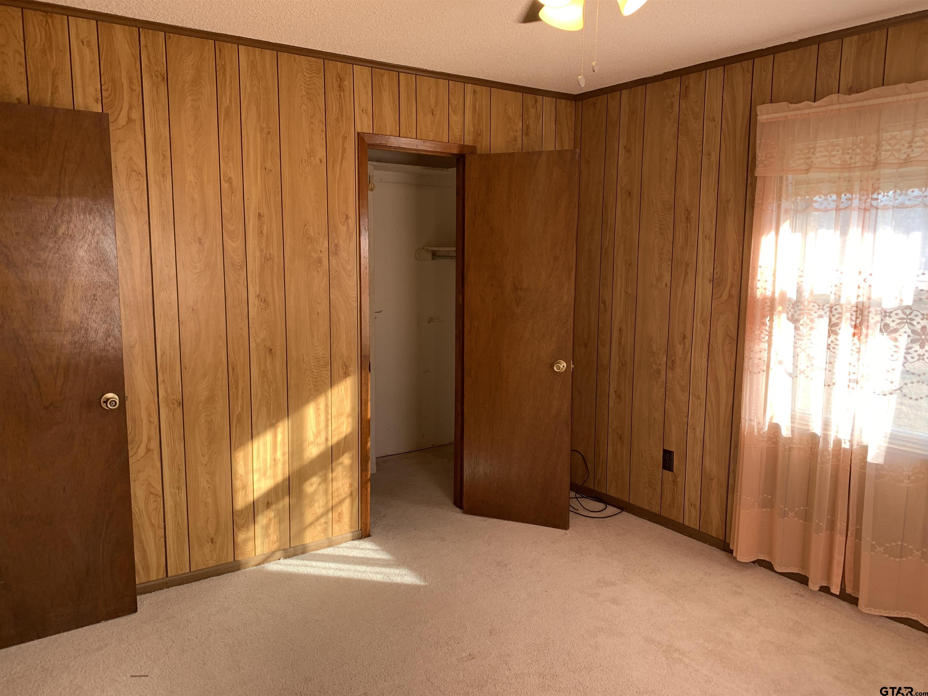 304 6th Street Southwest Bogata, TX 75417 - Photo 26 of 30 a view of a bathroom with shower and a window
