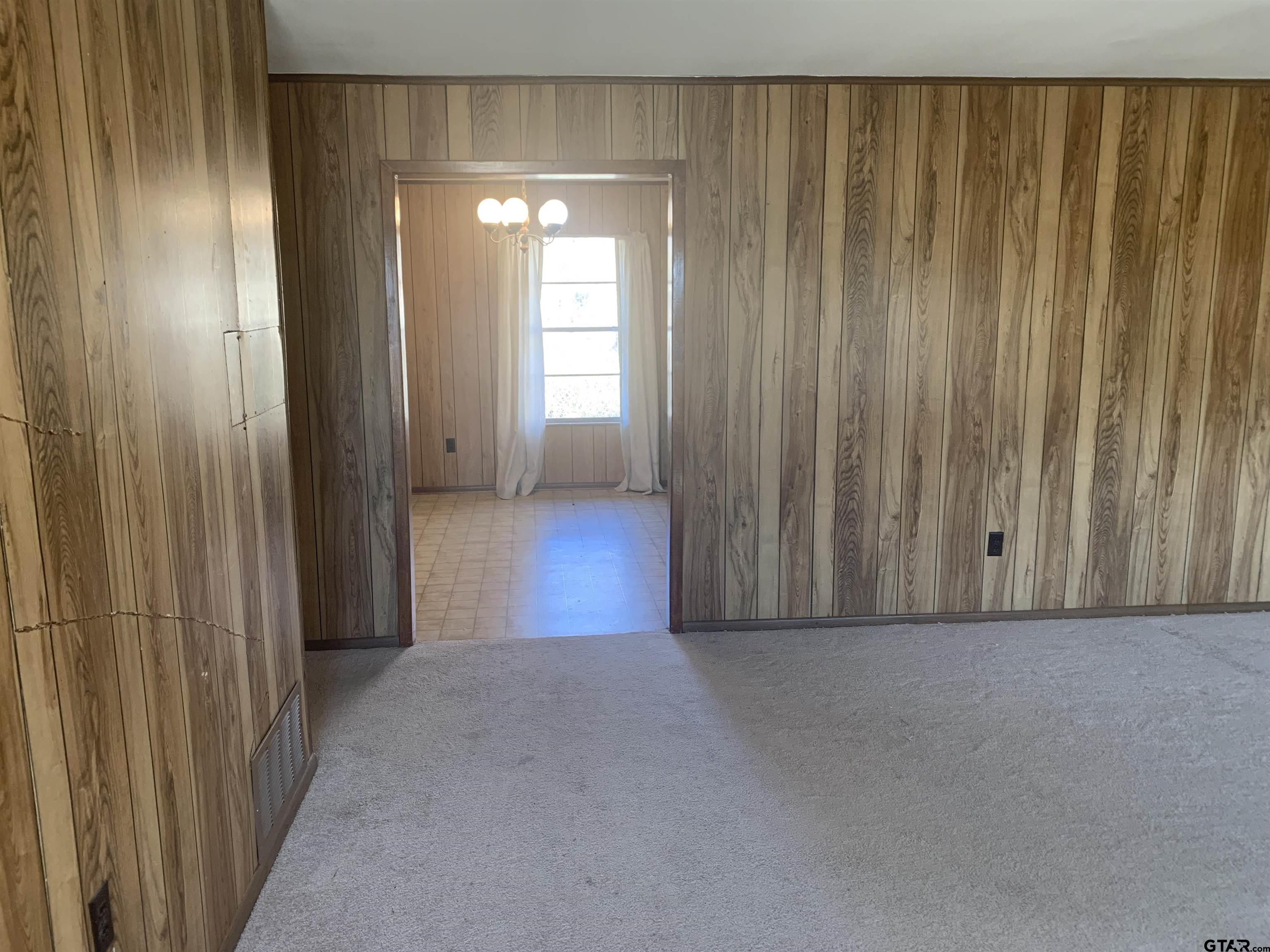 304 6th Street Southwest Bogata, TX 75417 - Photo 8 of 30 a view of a hallway with wooden floor