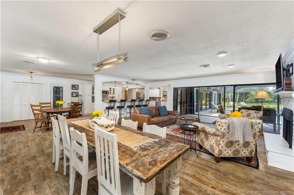 4 Ridgeview Road North Stuart, FL 34996 - Photo 17 of 57 a living room with lots of furniture and a large window