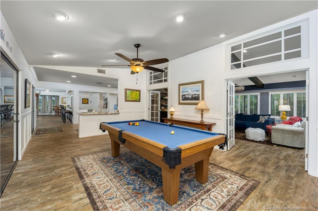 4 Ridgeview Road North Stuart, FL 34996 - Photo 26 of 57 a living room with stainless steel appliances lots of furniture and rug