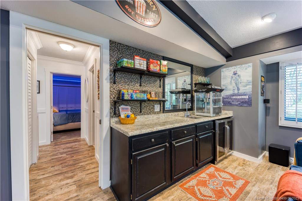 4 Ridgeview Road North Stuart, FL 34996 - Photo 29 of 57 a kitchen with stainless steel appliances granite countertop a stove and cabinets