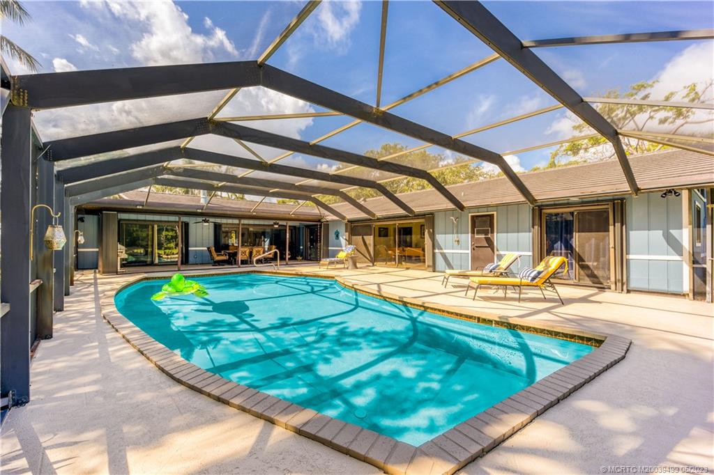 4 Ridgeview Road North Stuart, FL 34996 - Photo 47 of 57 a view of a house with swimming pool