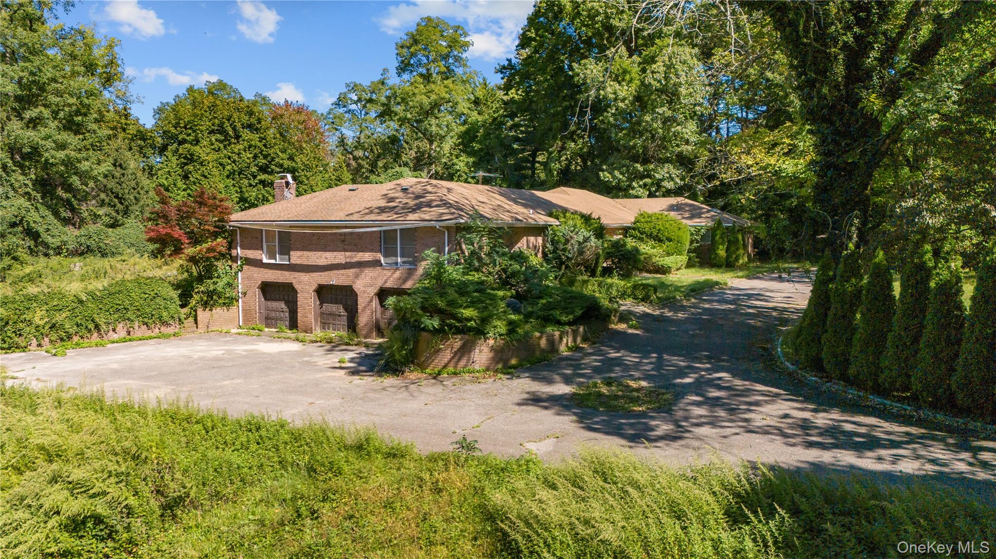 169 Middle Neck Road Sands Point, NY 11050 - Photo 9 of 15 a view of a house with a yard