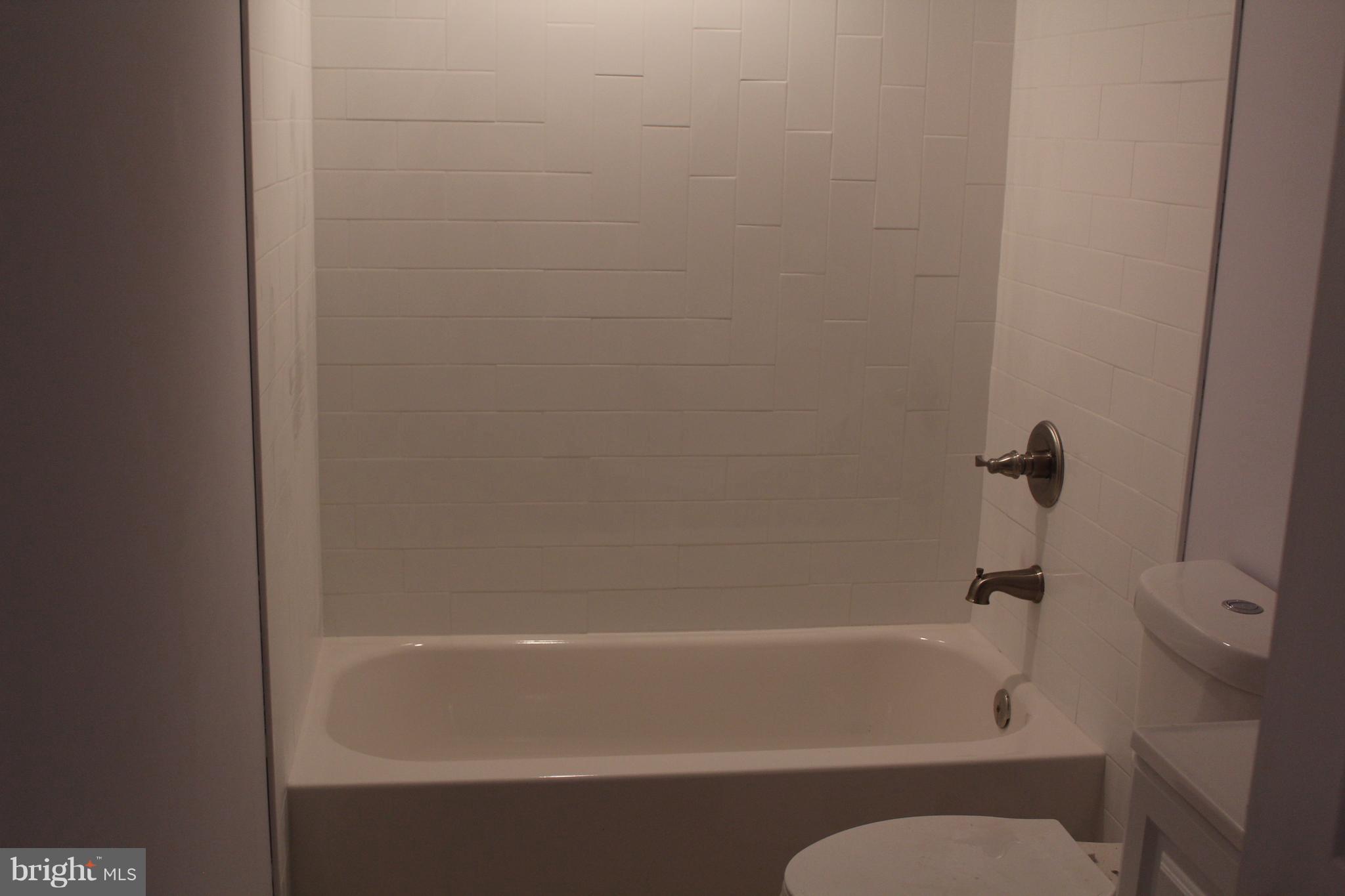 649 Columbia Road Northwest Washington, DC 20001 - Photo 15 of 20 apartment tiled bath