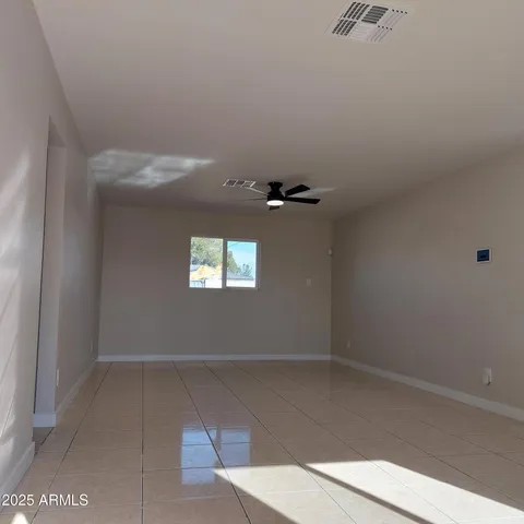 a kitchen with cabinets and appliances