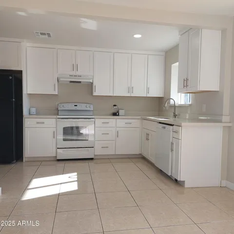 a view of hallway with shower