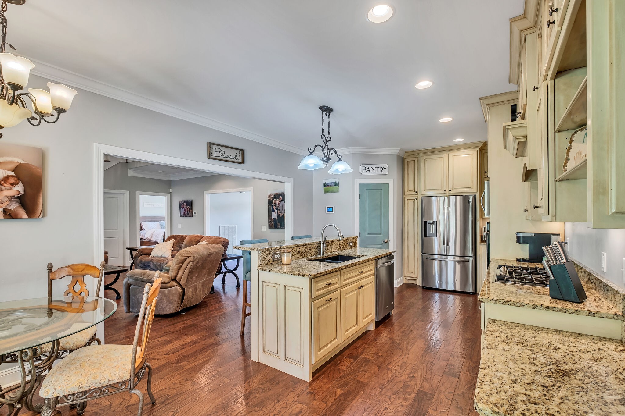 244 Double Eagle Drive Summertown, TN 38483 - Photo 16 of 55 a open kitchen with stainless steel appliances granite countertop a stove and a refrigerator
