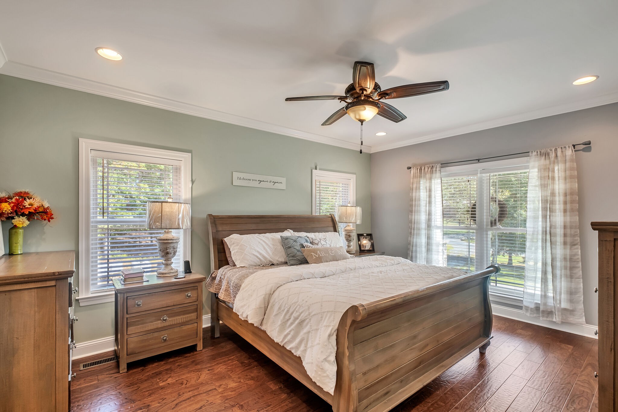 244 Double Eagle Drive Summertown, TN 38483 - Photo 20 of 55 a bedroom with a large bed and wooden floor