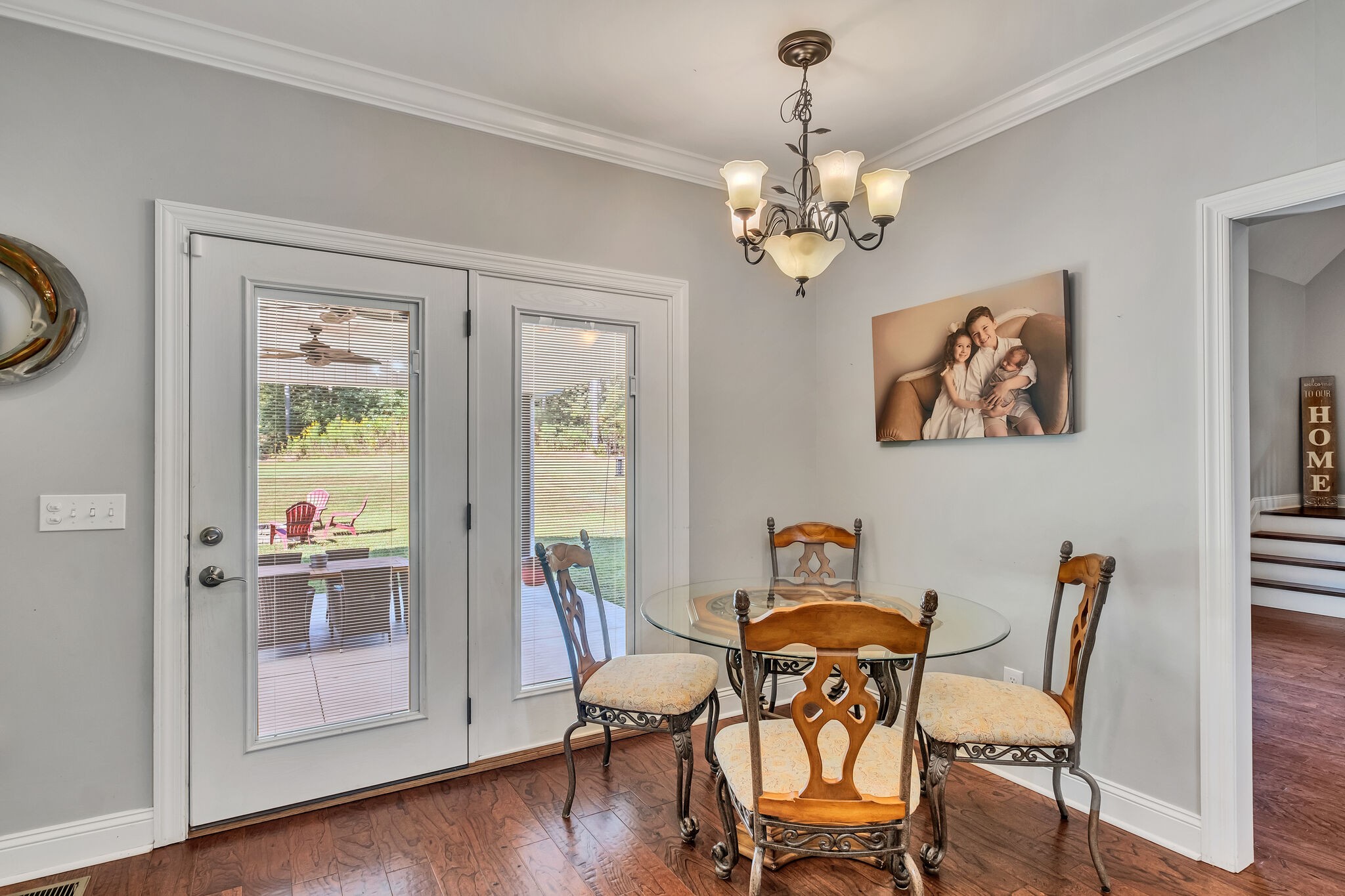 244 Double Eagle Drive Summertown, TN 38483 - Photo 21 of 55 a view of a dining room with furniture wooden floor and a chandelier