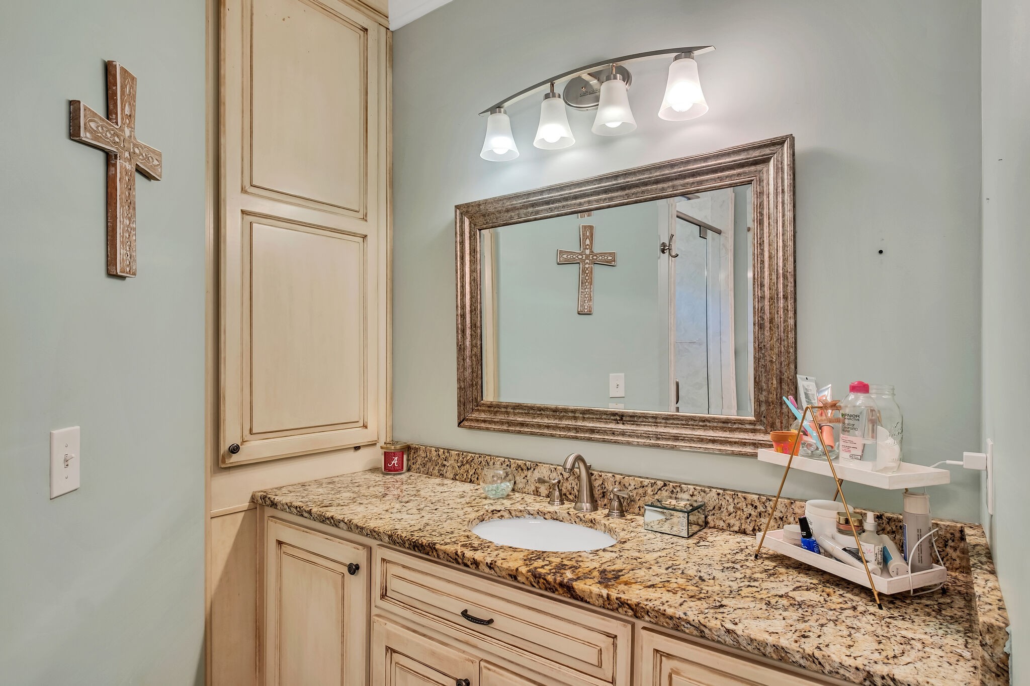 244 Double Eagle Drive Summertown, TN 38483 - Photo 26 of 55 a bathroom with a granite countertop sink and a mirror