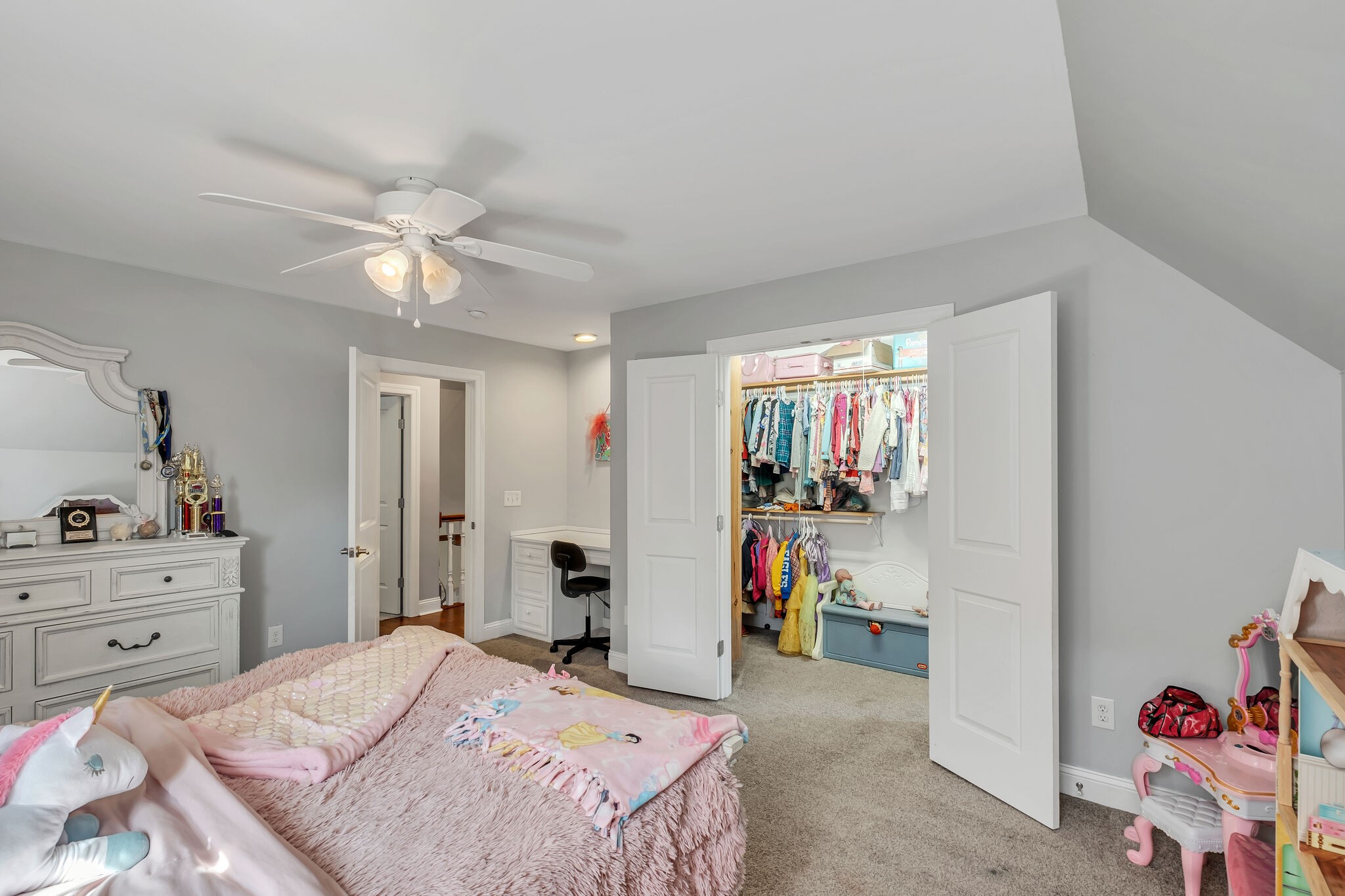 244 Double Eagle Drive Summertown, TN 38483 - Photo 32 of 55 a bed room with a bed and a chandelier