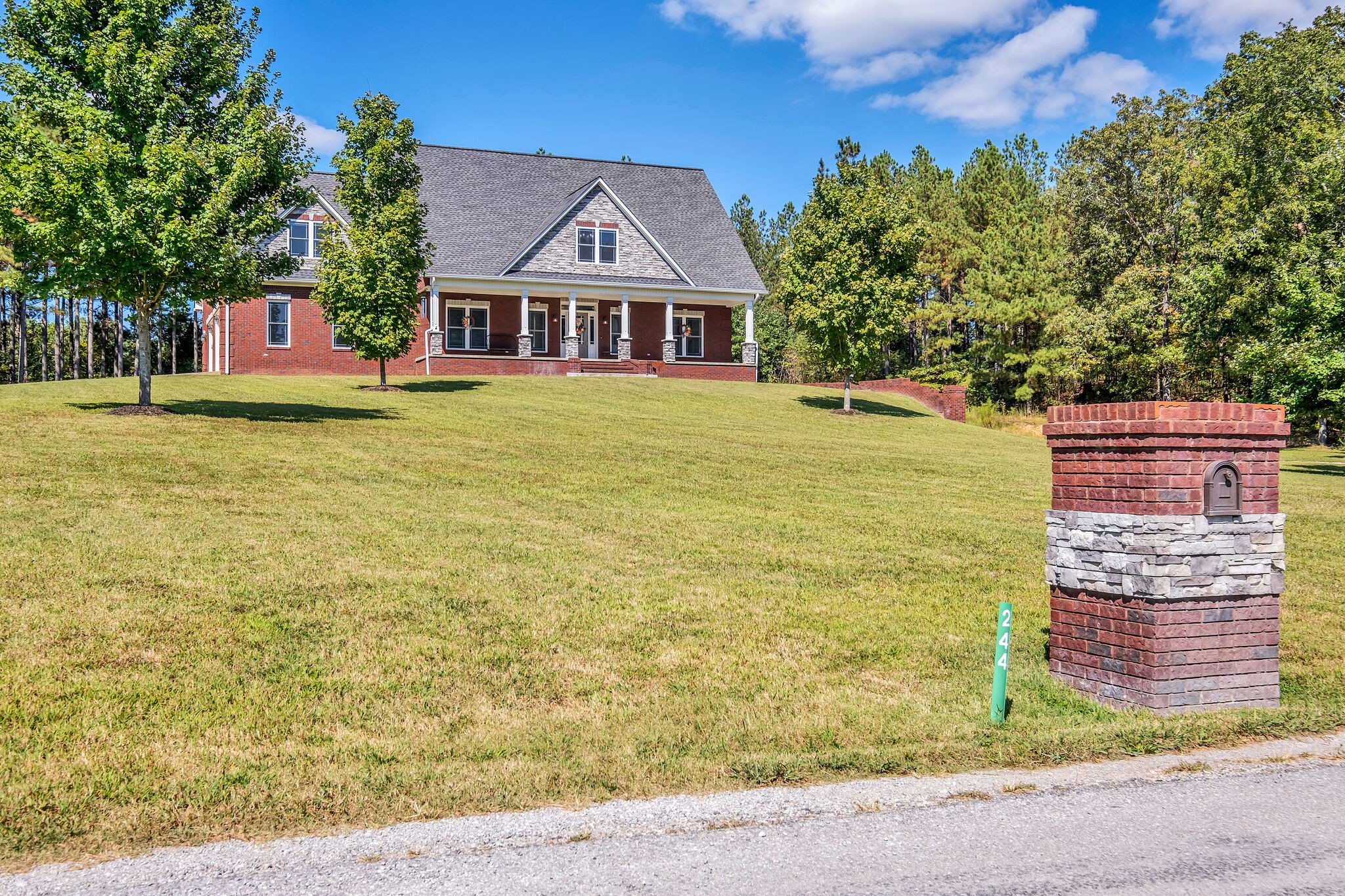 244 Double Eagle Drive Summertown, TN 38483 - Photo 46 of 55 a front view of a house with a garden