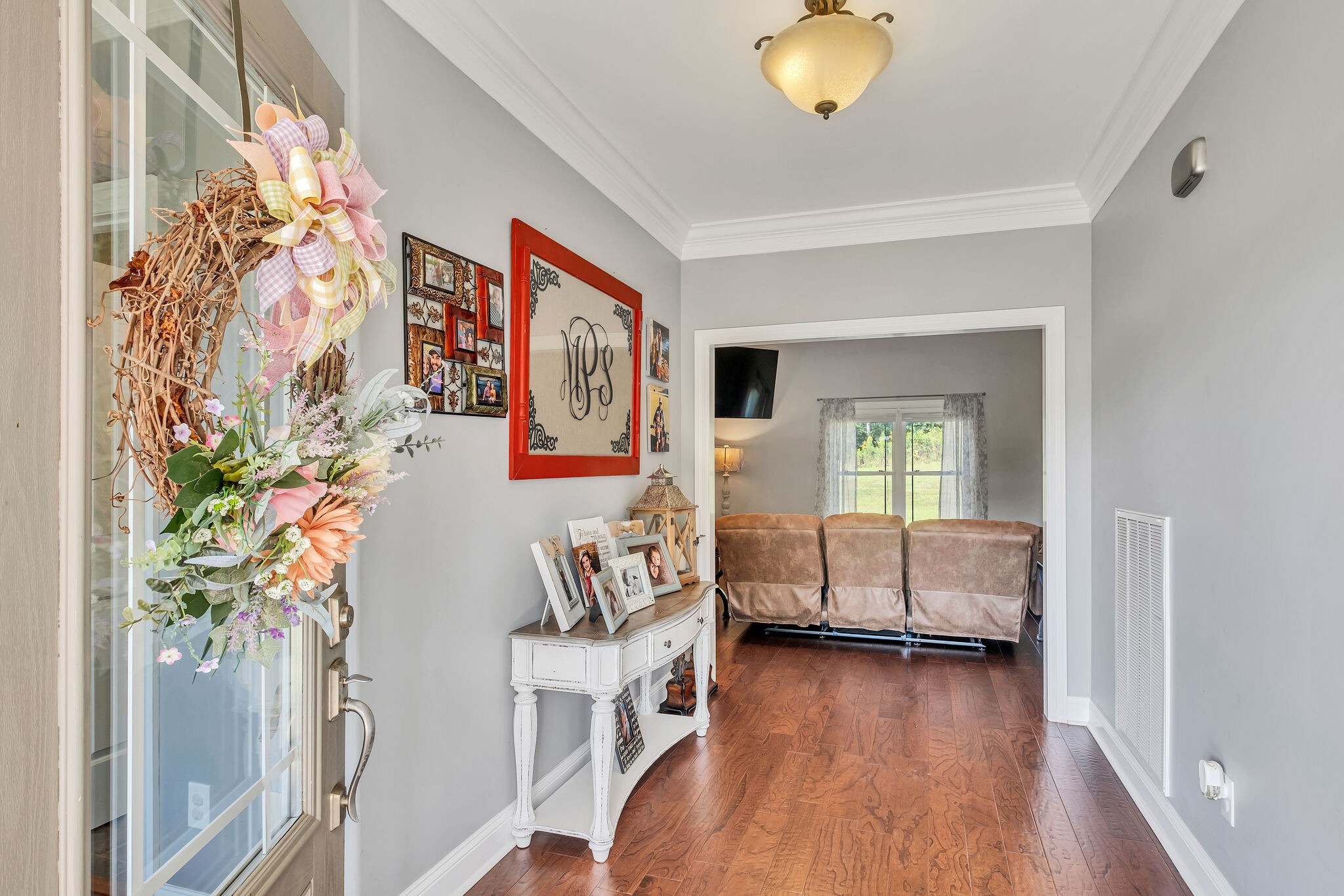 244 Double Eagle Drive Summertown, TN 38483 - Photo 8 of 55 a living room with furniture and flowers