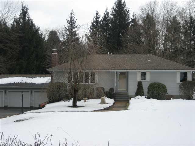 24 Johnson Road Marlborough, CT 06447 - Photo 1 of 1 a front view of a house with a yard covered in snow