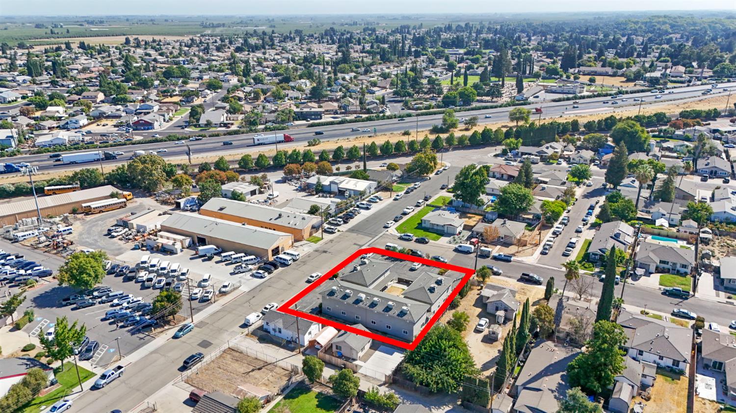 410 Pine Street Ripon, CA 95366 - Photo 2 of 16 an aerial view of a city with lots of residential buildings