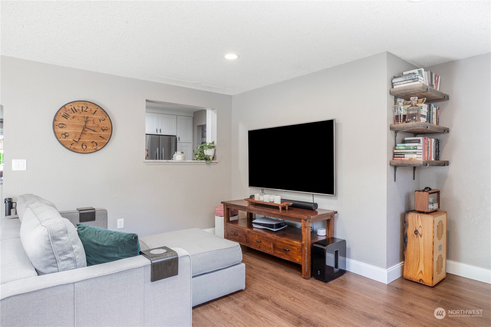 1826 225th Street Southeast Bothell, WA 98021 - Photo 11 of 33 a living room with furniture and a flat screen tv