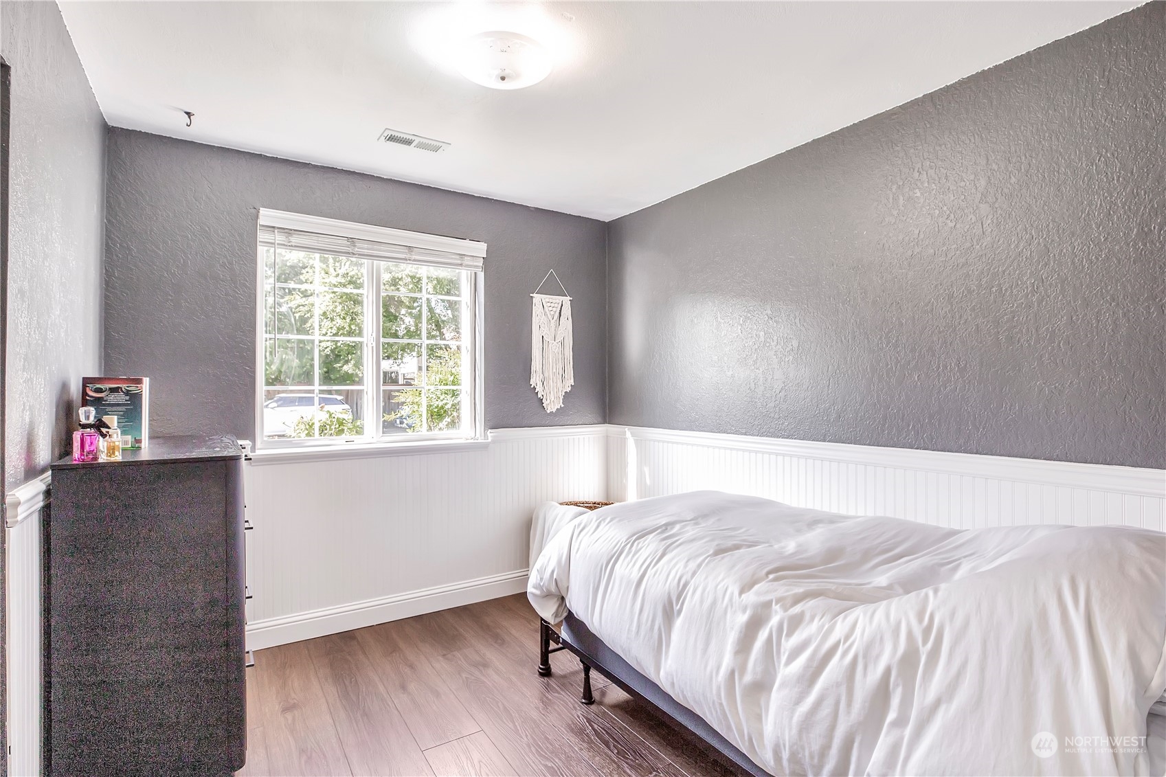 1826 225th Street Southeast Bothell, WA 98021 - Photo 19 of 33 a bedroom with a bed and a window