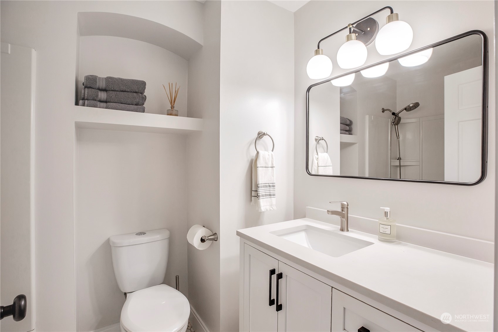 1826 225th Street Southeast Bothell, WA 98021 - Photo 25 of 33 a bathroom with a toilet sink and mirror