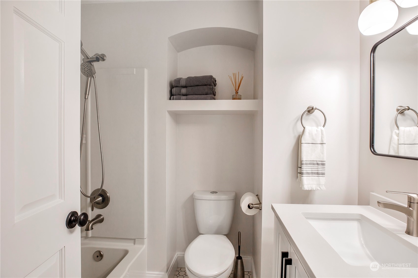 1826 225th Street Southeast Bothell, WA 98021 - Photo 26 of 33 a bathroom with a sink vanity mirror and toilet