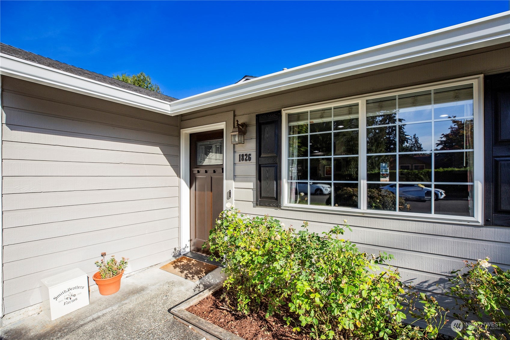 1826 225th Street Southeast Bothell, WA 98021 - Photo 3 of 33 a view of a house with a potted plant