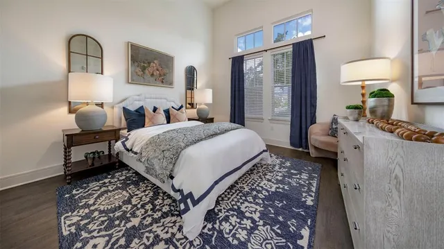 a kitchen with stainless steel appliances granite countertop a stove and a wooden floors