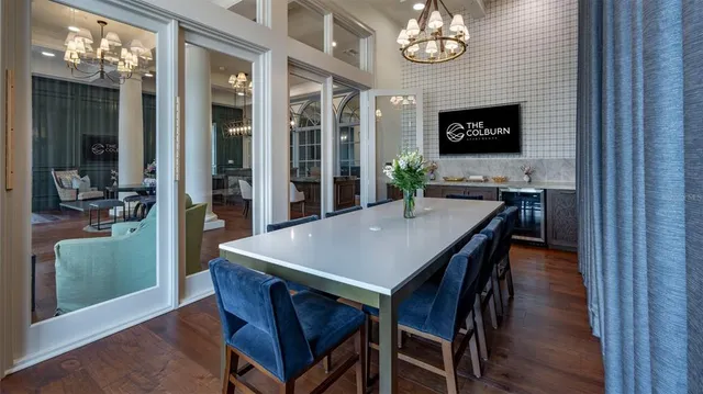 a living room with furniture fireplace and flat screen tv