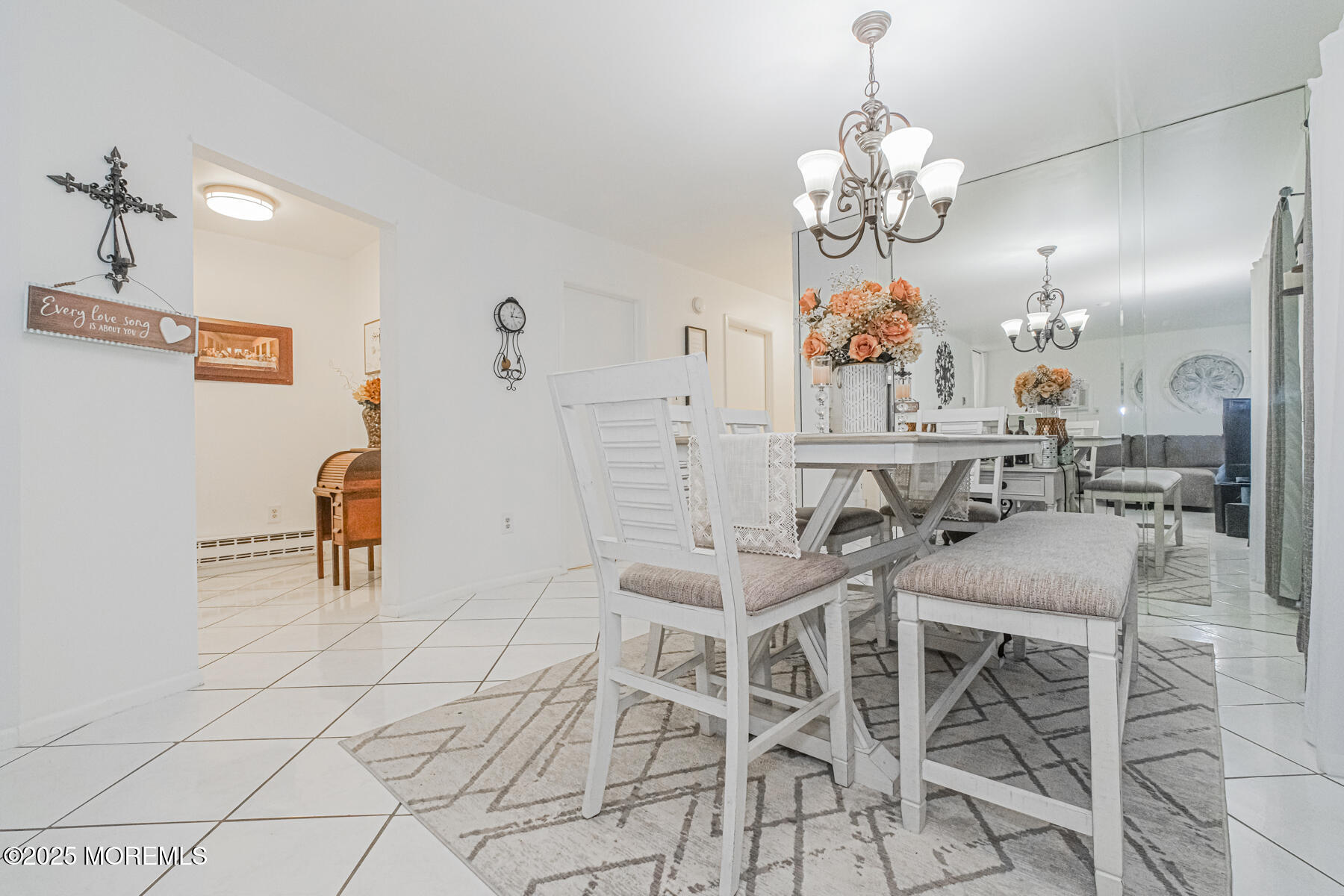 75 Overlook Way, Unit K Manalapan, NJ 07726 - Photo 12 of 24 a view of a dining room with furniture