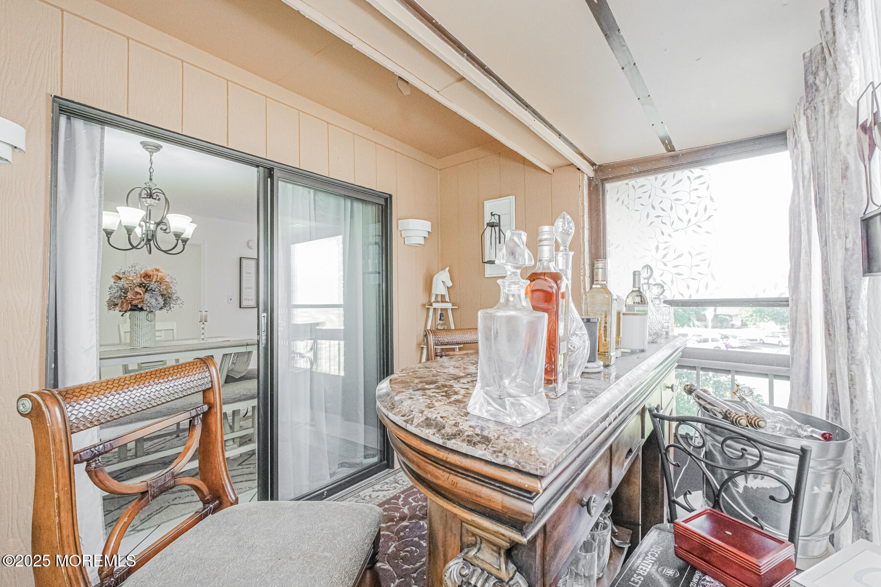 75 Overlook Way, Unit K Manalapan, NJ 07726 - Photo 15 of 24 a dining room with furniture and window