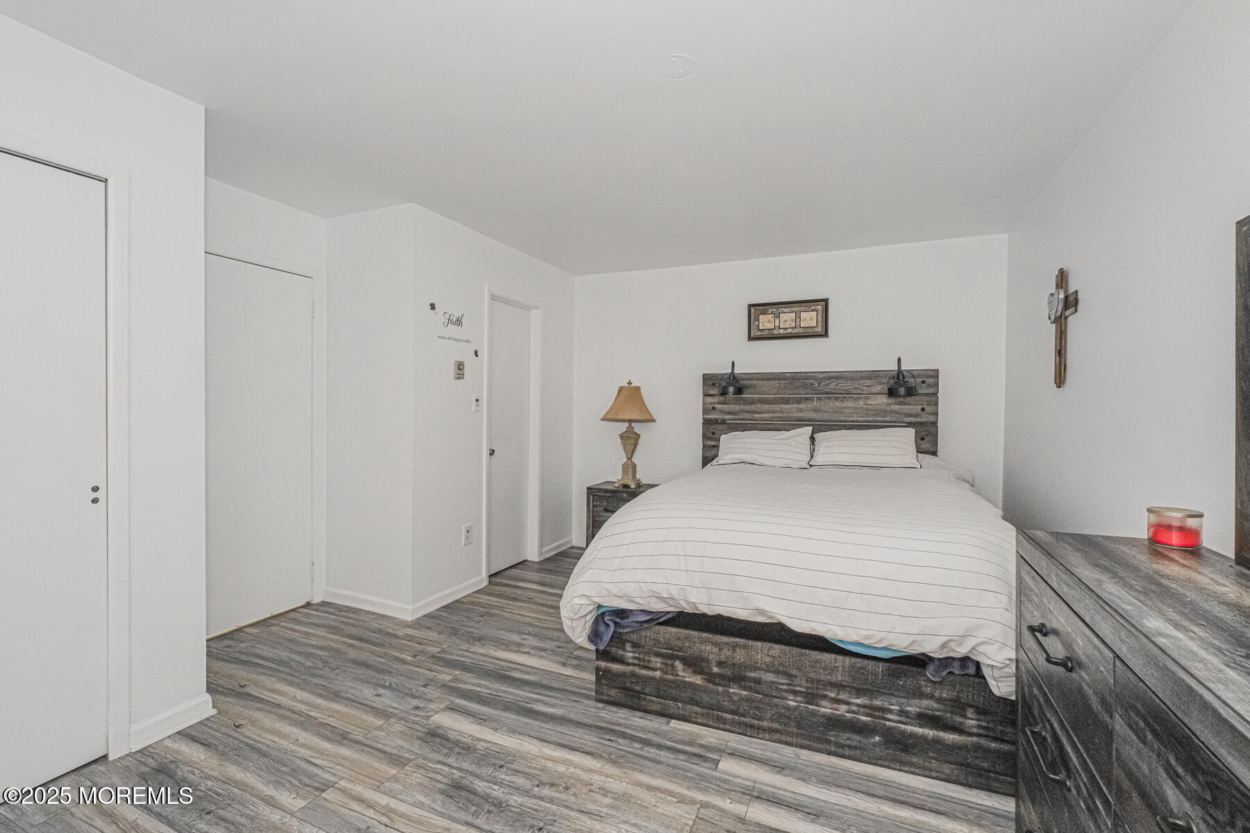 75 Overlook Way, Unit K Manalapan, NJ 07726 - Photo 19 of 24 a bedroom with a bed and a closet