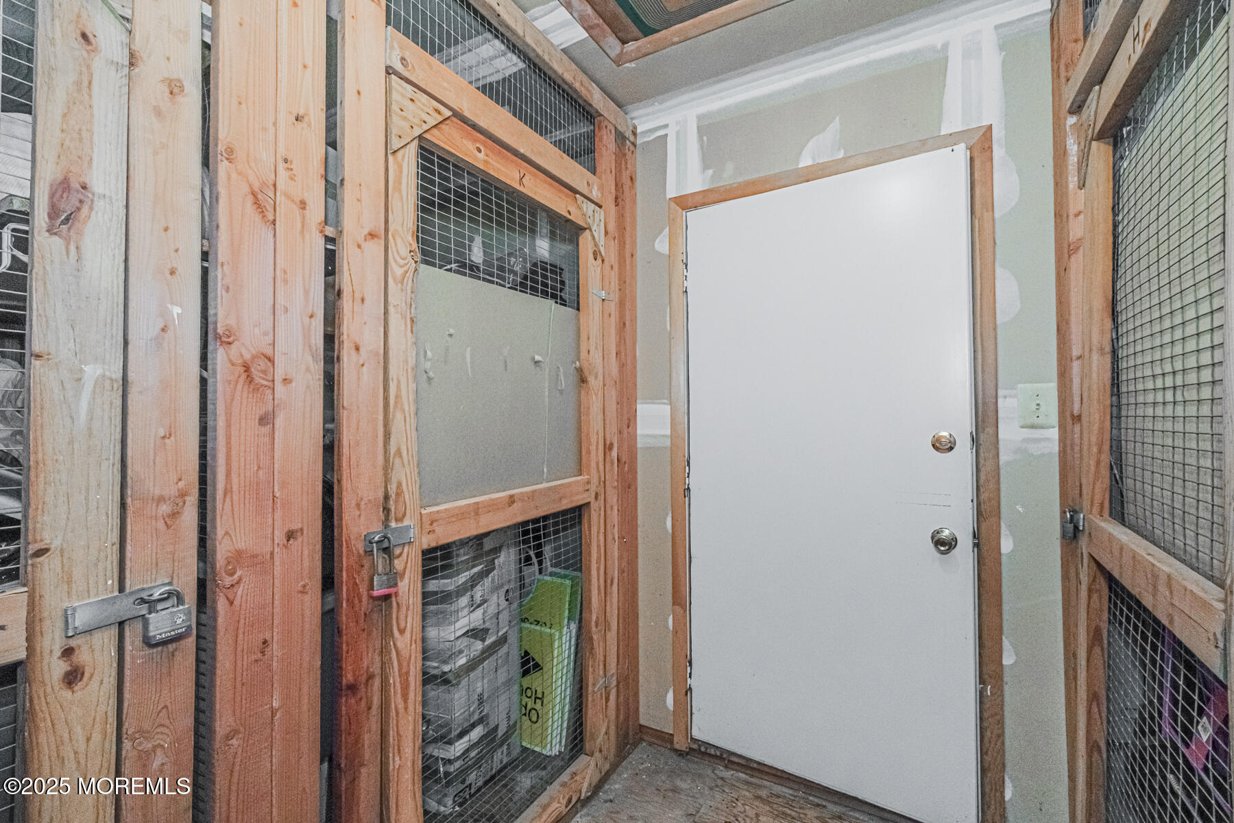 75 Overlook Way, Unit K Manalapan, NJ 07726 - Photo 23 of 24 a door with a small yard