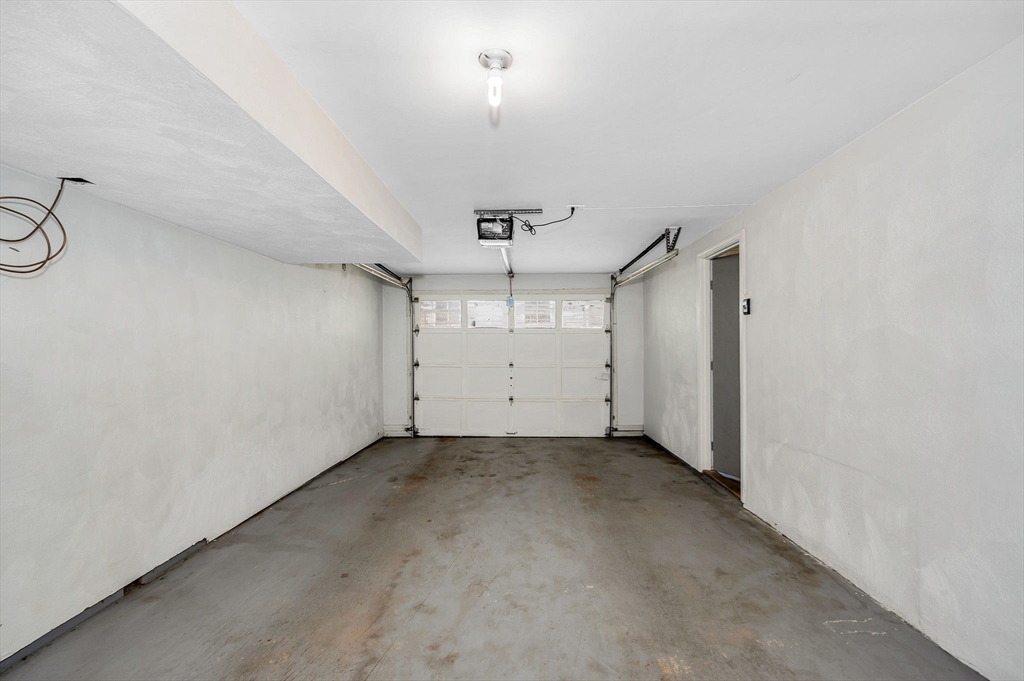 31 Patrick Road, Unit 31 Tewksbury, MA 01876 - Photo 38 of 40 an empty room with a ceiling fan and window