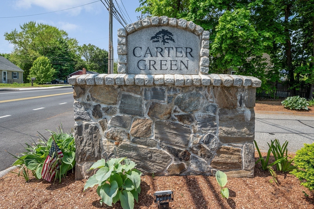 31 Patrick Road, Unit 31 Tewksbury, MA 01876 - Photo 5 of 40 a front view of a house with garden
